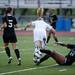 Huron freshman Chea Rael-Whitsitt slides to take the ball away from a Skyline player on Thursday, May 30. Daniel Brenner I AnnArbor.com
